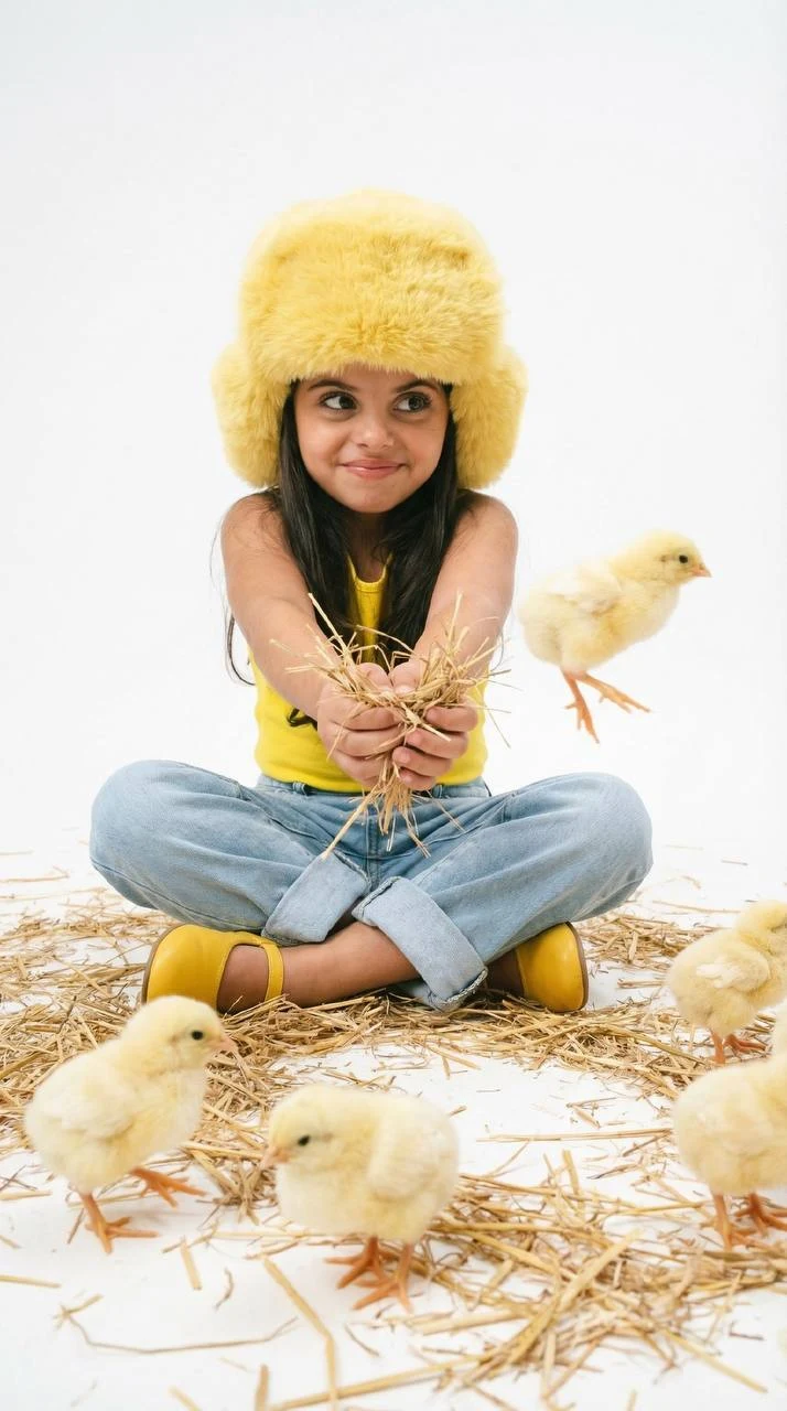 Child Studio Session With Yellow Chicks