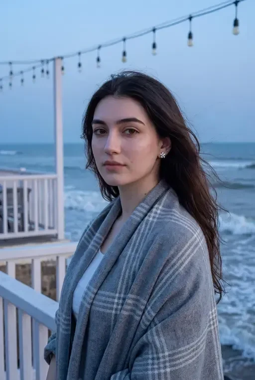 Woman on Seaside Terrace at Blue Hour