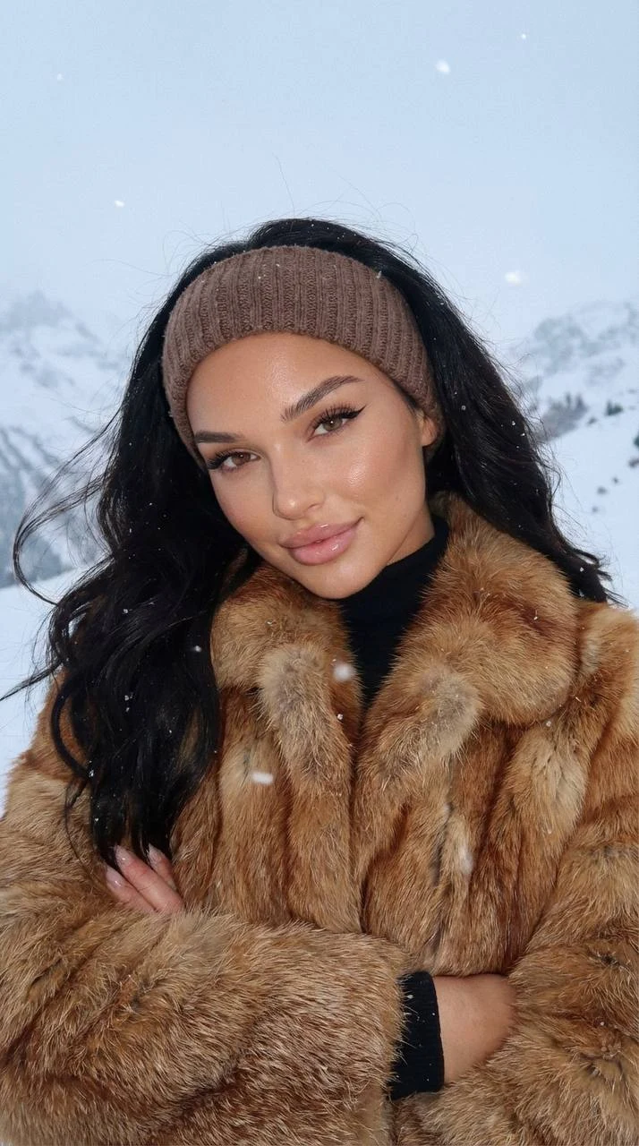 winter mountain portrait with fur coat