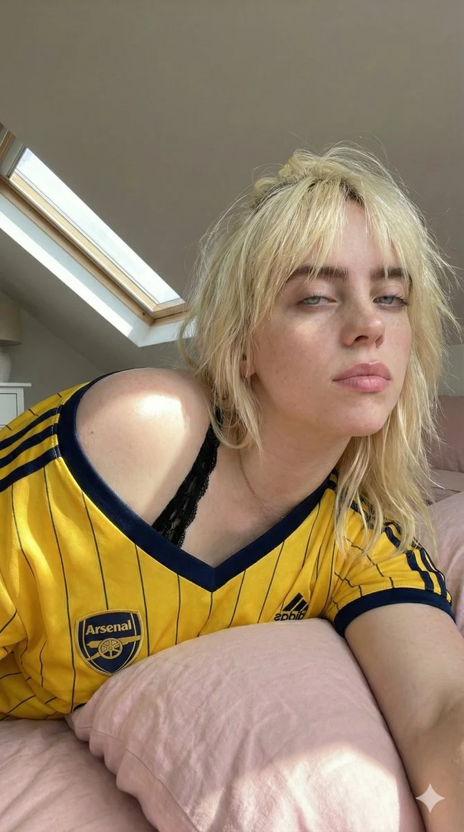 Young Woman in Soccer Jersey Attic Selfie